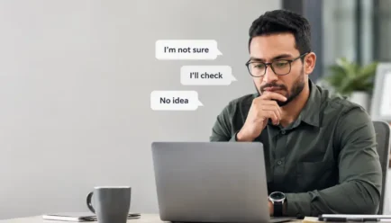 **Alt text:** Person thoughtfully considering alternative ways to say “I don’t know” during a professional conversation.