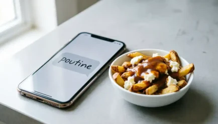A smartphone displaying the word "poutine" in a text message bubble next to a bowl of Canadian poutine, visually illustrating the poutine meaning in texting.